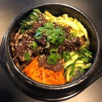 Bibimbap · 5 kinds of colorful vegetables on a bed of rice with special sauce.