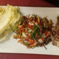 41. Gul Bo Ssam · Cabbage wraps with spicy oyster salad and pork belly