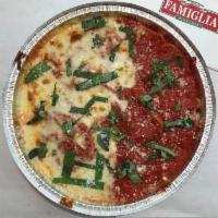Eggplant Parmigiana · Served with choice of ziti or spaghetti. 493 calories.