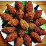 Round Kibbee · Egg-shaped burghul cracked wheat shell, stuffed with ground beef, pine nuts, onions and spic...