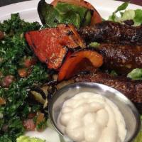 Beef Kafta Kebob Platter · Mixed ground beef marinated with onions, parsley, and seasonings, topped with tahini sauce.