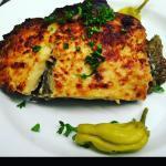 Mosaka · Casserole of eggplant layers filled with spiced ground beef, potatoes, topped with creamy be...