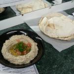 Large Babaghanoug Sandwich · Mashed smoked eggplant with tahini sauce, fresh garlic and lemon juice wrapped in a pita bre...