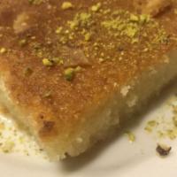 Nomoura · Homemade semolina cake made with butter and yogurt, sweetened with our special syrup made wi...