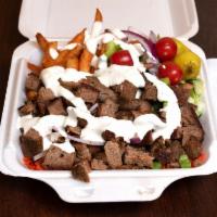 2. Lamb Platter · Served with rice, salad and fries or hummus.
