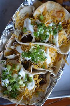 Taco Plate · Three brisket or pork tacos cheese and sour cream.
