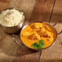 Chicken Tikka Madras · Boneless tender white meat cooked in coconut milk, a blend of the chef's special tomato and ...