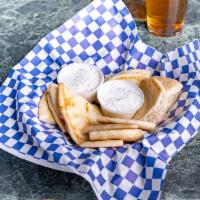 Pita Basket · 2 hot pitas in bite size chunks served with our special tzatziki sauce for dipping.