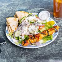 Chicken Salad · Greek Salad served with marinated char-broiled chicken breast and served with pita bread.