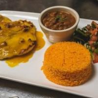 Pechuga de Pollo al Limon · Chicken breast in lime sauce. Served with choice of side.