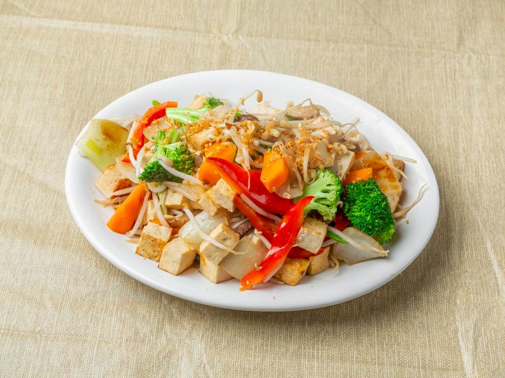 Stir Fried Tofu · Stir fried tofu with bean sprouts, bell pepper, scallions, mushroom, and soy sauce. Served with jasmine rice.