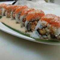 Bellagio Roll · Shrimp tempura, crab and masago  inside, salmon on the outside.