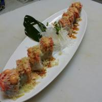 Venetian Roll · Shrimp tempura inside, crab, masago and crunch on the outside.