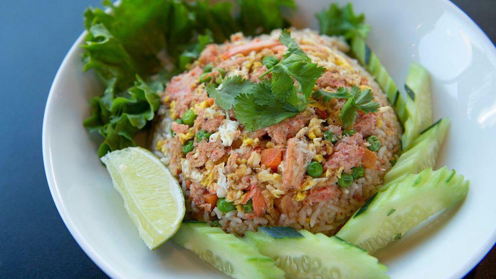 Crab Fried Rice · Jasmine rice stir-fried with egg, crab meat, pea-carrot, cilantro and fresh cucamber