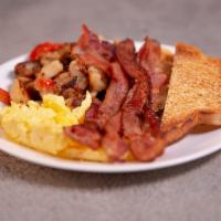 Bacon and Eggs · 4 piece of bacon, 2 eggs any style and breakfast potatoes, hash browns or fruit.