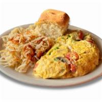 Veggie Omelet · Made with mushrooms, onions, bell pepper, tomato, and Swiss cheese. 