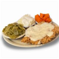 Chicken Fried Chicken Plate · Our Norma's, award-winning chicken breast fried golden brown and smothered with cream gravy. 