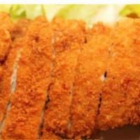 Chicken Breast Katsu · Crispy Japanese style fried chicken cutlet. Served with steamed rice and salad.