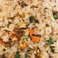 Chicken Fried Rice · Delicious Japanese style fried rice with egg, vegetables, and chicken.