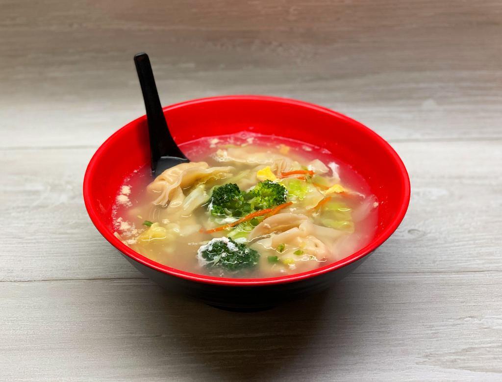 Wonton Soup · Delicious Chinese dumpling soup topped with flavorful vegetables.