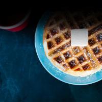 The Classic Waffle · Belgian waffle with maple butter and powdered sugar.
