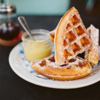 Lemon Curd Waffle · Belgian waffle served with a side of lemon curd.