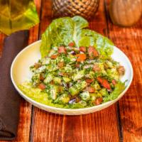 Shirazi Salad · Diced tomatoes, cucumbers, onions, lemon juice, olive oil, parsley and mint.