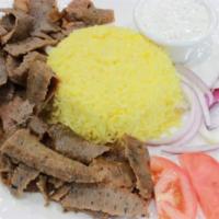 Gyro Platter · Roasted beef and lamb. Served with basmati saffron rice, tzatziki sauce and pita bread.
