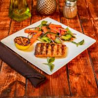 Salmon Platter · Charbroiled salmon with rosemary thyme sauce with the choice of basmati saffron rice or saut...