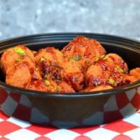 Nashville Hot Cauliflower  · Crispy-fried cauliflower drizzled with Nashville hot sauce and served with ranch dipping sau...