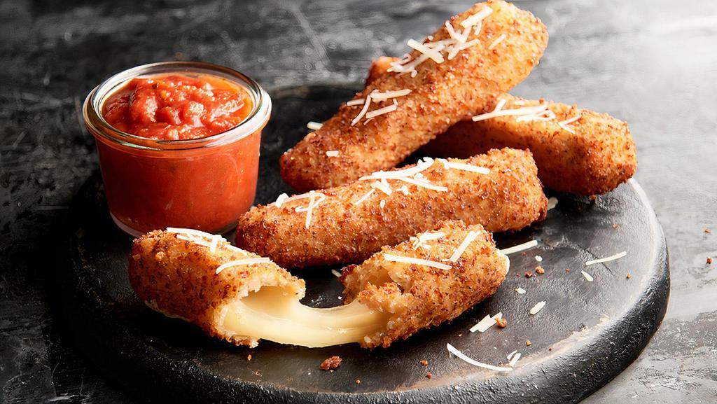 Mozzarella Bricks · Hand-breaded in herb-panko breadcrumbs, lightly fried and served with marinara sauce  
