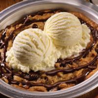 Cookie Blitz · Fresh-baked chocolate chip cookie, drizzled with chocolate syrup and topped with vanilla ice...