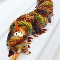Super Dragon Roll · In: shrimp tempura, cucumber and avocado. Out: eel, avocado and eel sauce.