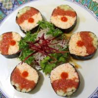 Ninja No Rice Roll · Spicy tuna, crab mix, cucumber wrapped with dried seaweed, ponzu sauce and Sriracha.