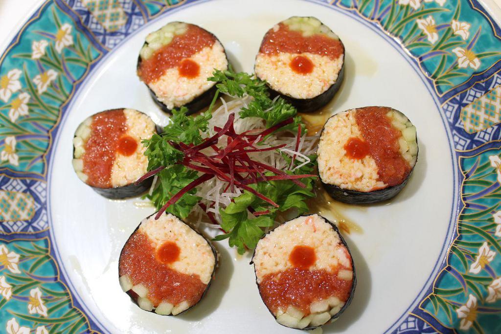 Ninja No Rice Roll · Spicy tuna, crab mix, cucumber wrapped with dried seaweed, ponzu sauce and Sriracha.