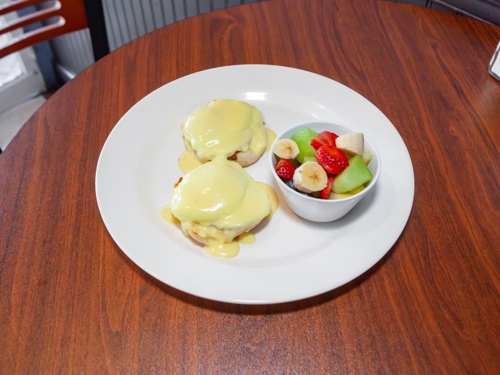 Egg Benedict · 2 poached eggs with Canadian bacon on an English muffin and topped with hollandaise sauce.