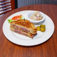 Pastrami Reuben Sandwich Lunch · Served with coleslaw, potato salad, chips, or french fries.
