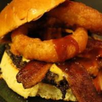 BBQ Bacon Burger* · Handmade 6oz Beef Patty, BBQ Sauce, Bacon, Cheddar, and Topped with an Onion Ring