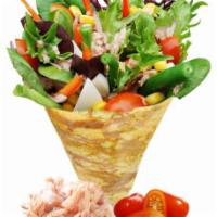 18. Tuna Nicoise Crepe · Tuna, boiled eggs, grape tomatoes, mesclun mix, red onions, red peppers, sesame dressing and...
