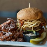 Big Bad Burger · Bourbon BBQ glazed, aged cheddar, pepper jack cheese and onion straws. Served with choice of...
