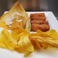Combo Criollo · 4 ham croquettes, one cuban tamal and mariquitas.