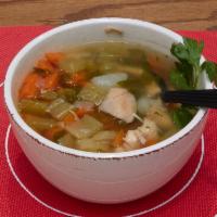63. Chicken N Vegetables Soup · 16oz homemade chicken soup.  Served with or without rice. Served with pita.