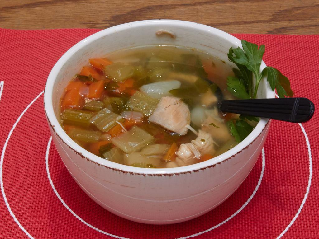 63. Chicken N Vegetables Soup · 16oz homemade chicken soup.  Served with or without rice. Served with pita.