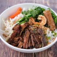 Grilled Combo Vermicelli Bowl · Grilled lemongrass chicken, grilled pork, grilled prawns, vermicelli rice noodles, lettuce, ...