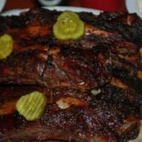 Beef Ribs Dinner · Served with fresh baked bread and a choice of 2 side dishes.