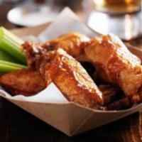 10 Buffalo Wings · Cooked wing of a chicken coated in sauce or seasoning.