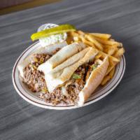 Philly Cheesesteak · Served with sauteed green peppers, mushrooms, onion, french fries and coleslaw.