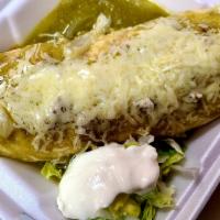 Chile Verde Burrito · Pork,onions and green sauce all grilled together, rice and beans