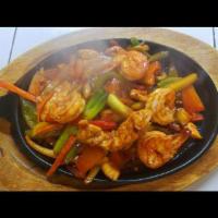 Shrimp Fajitas · Shrimp,onion, bell pepper, tomato, sukini Served with rice, beans, guacamole and tortillas.
