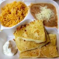Kid's Quesadilla · Served with beans, rice and sour cream.